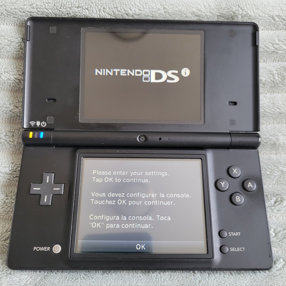 Nintendo DSi And 5 Games
